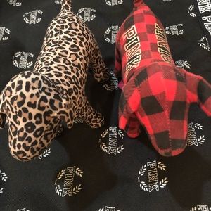 2 pink dogs with Victoria’s Secret red wristlet